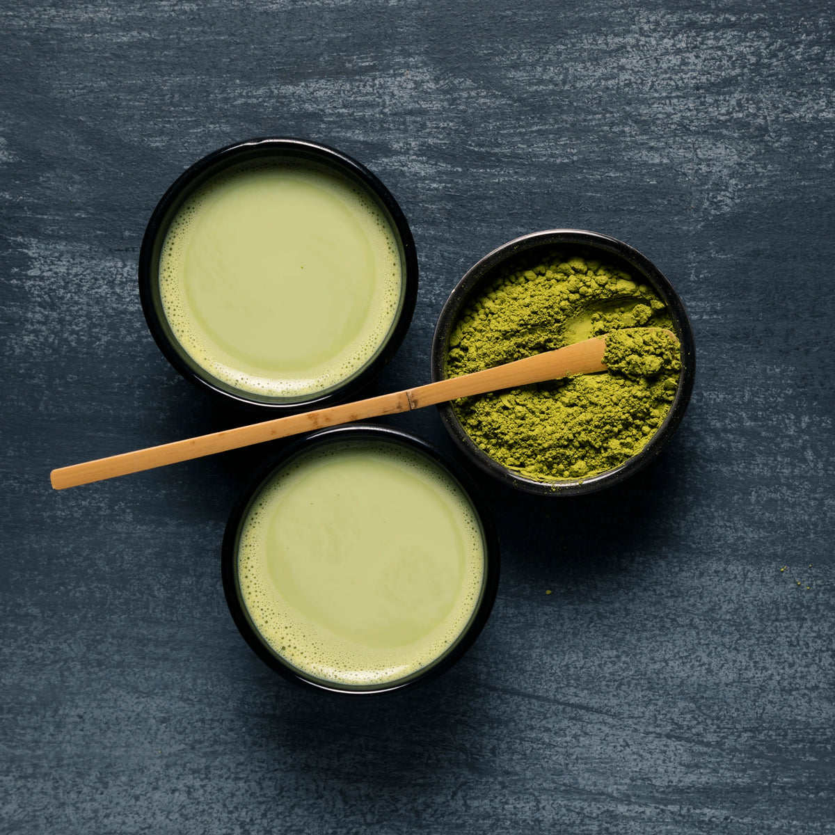 Loose leaf Matcha Mood artisan tea by Little Farm Town Coffees, vibrant green powder in a clear container.