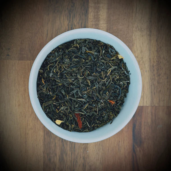 Loose leaf Jasmine Blossom artisan tea from Little Farm Town Coffees, showcasing delicate jasmine flowers and high-quality tea leaves.