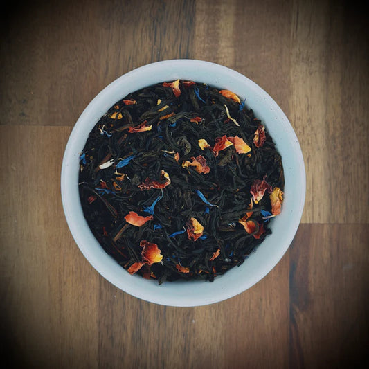 Loose leaf Peach Paradise artisan tea by Little Farm Town Coffees, showcasing fresh peach-flavored tea leaves in a 3oz package.