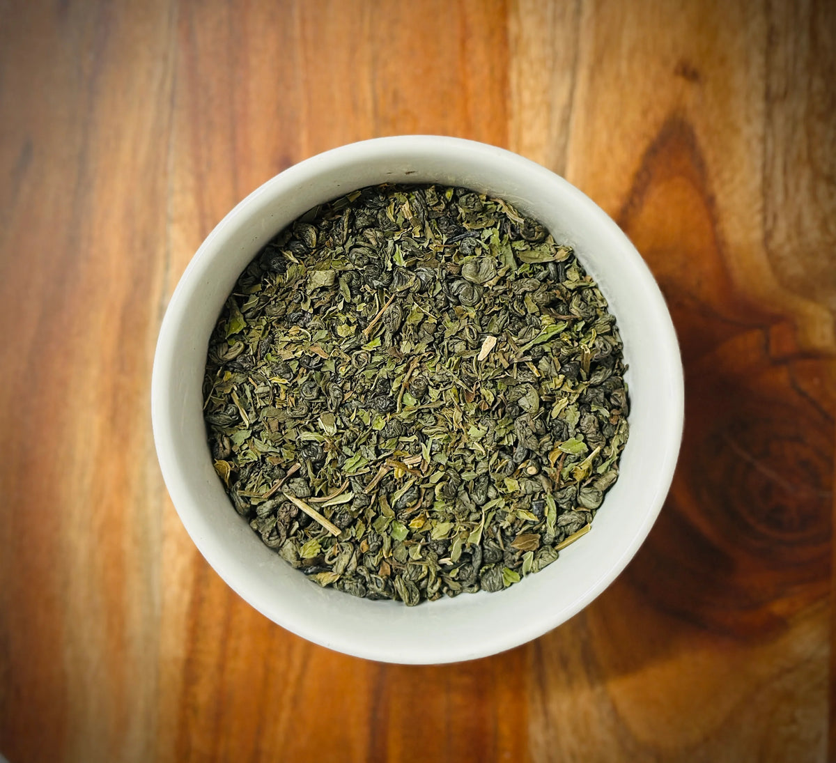 Fresh Moroccan mint leaves for artisan tea from Little Farm Town Coffees, displayed in a natural, vibrant arrangement.